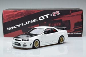 Nissan Skyline GT-R R34 Nismo Z-Tune Blanc MotorHelix 1:18 M83407 Métal Moulé — image 11 sur 11