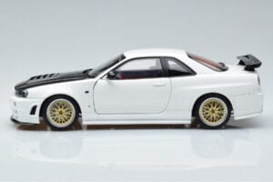 Nissan Skyline GT-R R34 Nismo Z-Tune Blanc MotorHelix 1:18 M83407 Métal Moulé — image 5 sur 11
