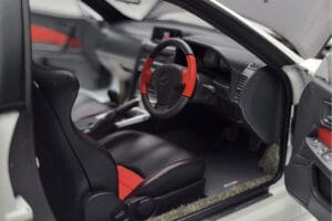 Nissan Skyline GT-R R34 Nismo Z-Tune Blanc MotorHelix 1:18 M83407 Métal Moulé — image 8 sur 11