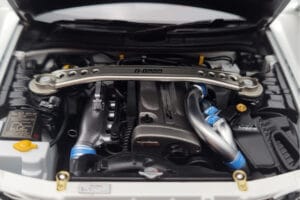 Nissan Skyline GT-R R34 Nismo Z-Tune Blanc MotorHelix 1:18 M83407 Métal Moulé — image 9 sur 11