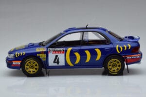 Subaru Impreza #4 C. McRae / D. Ringer Winner RAC Rally 1994 Kyosho 1:18 08962A Métal Moulé — image 4 sur 9