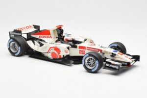 Honda Racing Team RA106 #11 R. Barrichello F1 2006 Minichamps 1:18 100060011 Métal Moulé — image 4 sur 6
