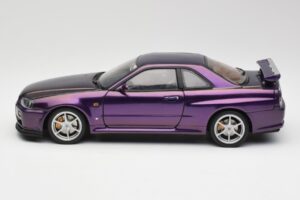 Nissan Skyline GT-R R34 V-Spec Midnight Violet AUTOart 1:18 77305 Métal Moulé — image 4 sur 8
