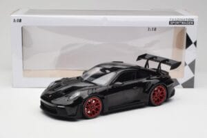 Porsche 911 992 GT3 RS Noir & Roues Rouges & Décor Noir Minichamps 1:18 153062240 Métal Moulé — image 6 sur 6
