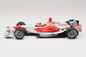 Panasonic Toyota Racing TF106 #12 R. Schumacher 2006 Minichamps 1:18 AM59557K Métal Moulé — image 3 sur 7